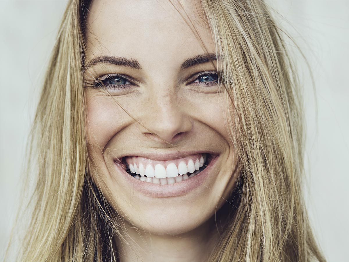 Cosmetic Dentistry - Happy woman smiling